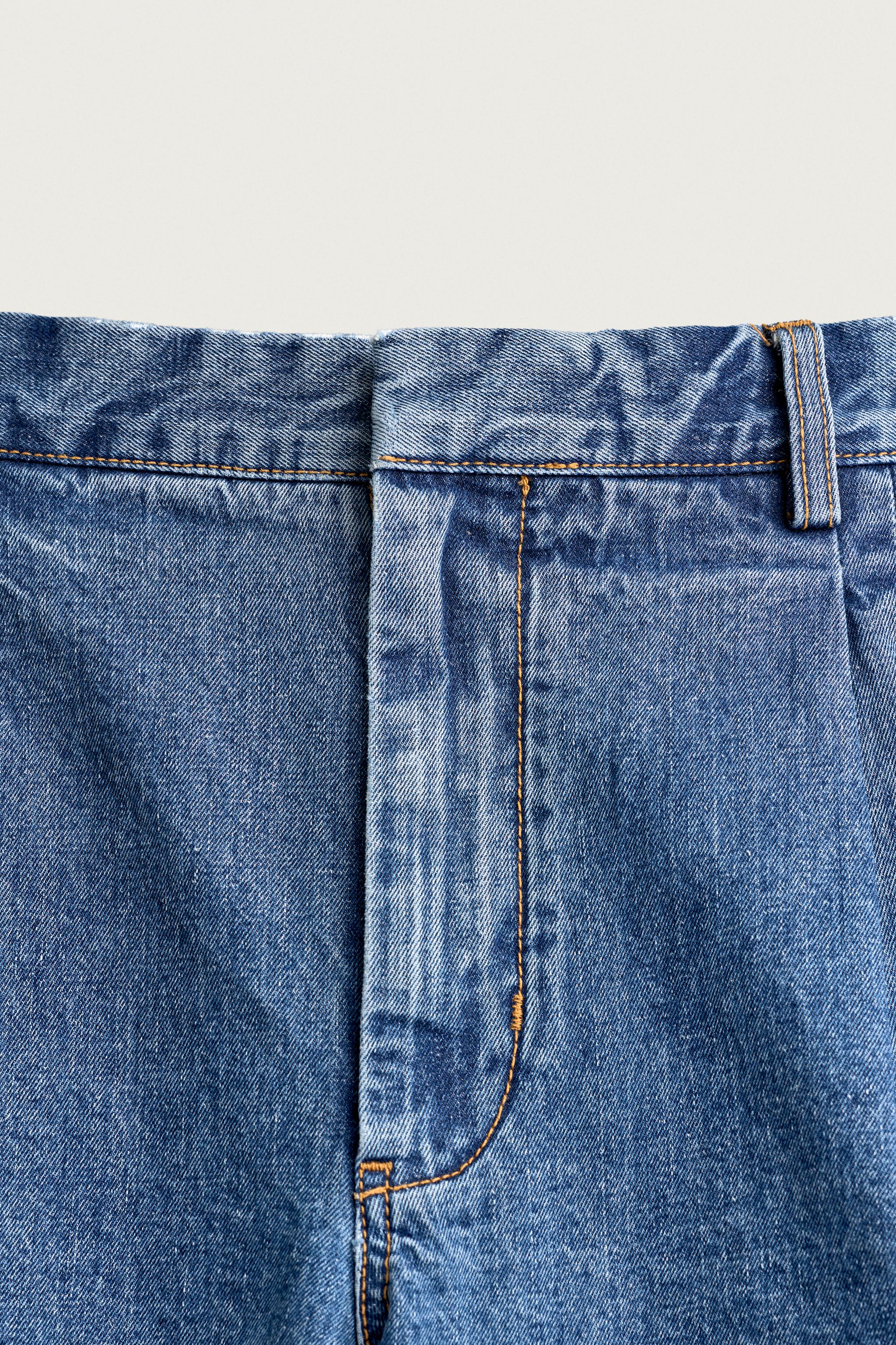REGULAR FIT PLEATED DENIM SHORTS